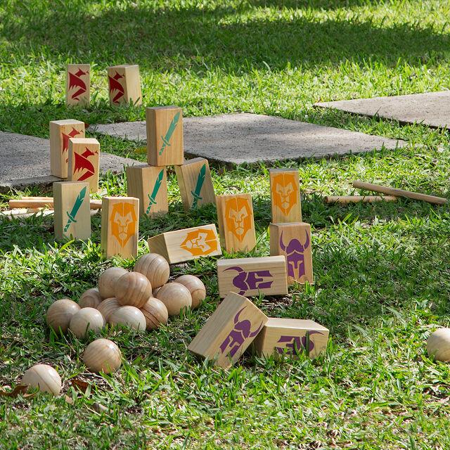 lawn game consisting of wooden "castles" and wooden balls