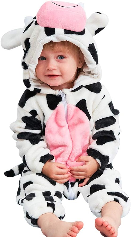 image of child wearing a cow onesie