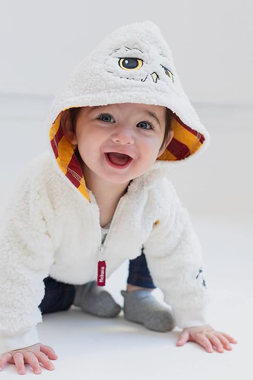 image of baby wearing a fleece Harry Potter Hedwig jacket