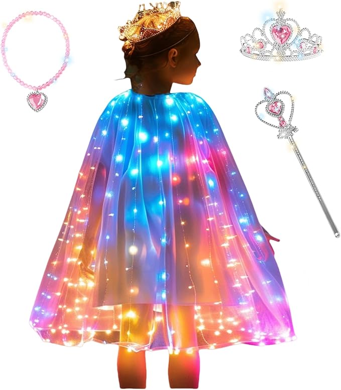 image of girl wearing an illuminated cape; also in the picture are a tiara, wand and necklace