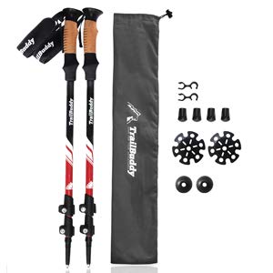 image of set of trekking poles with different tips and baskets as accessories