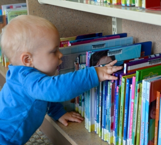 Baby Browsing Shelves