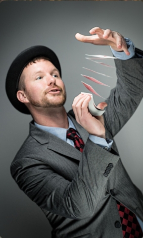 James the Magician performing a card trick