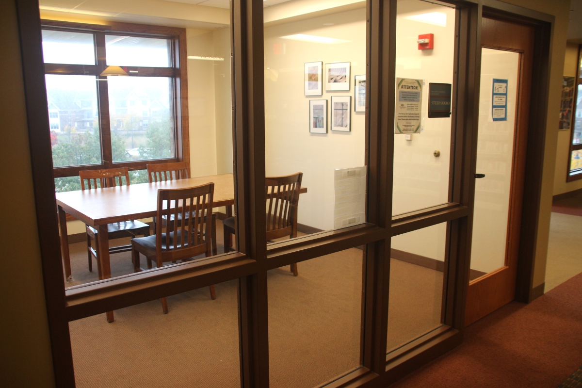 Study Room A, a small, windowed room with table and chairs